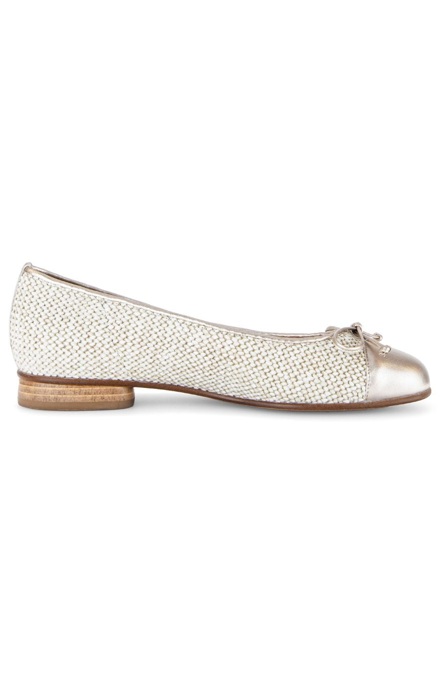 Gold ballerina shoe with a bow on a white background