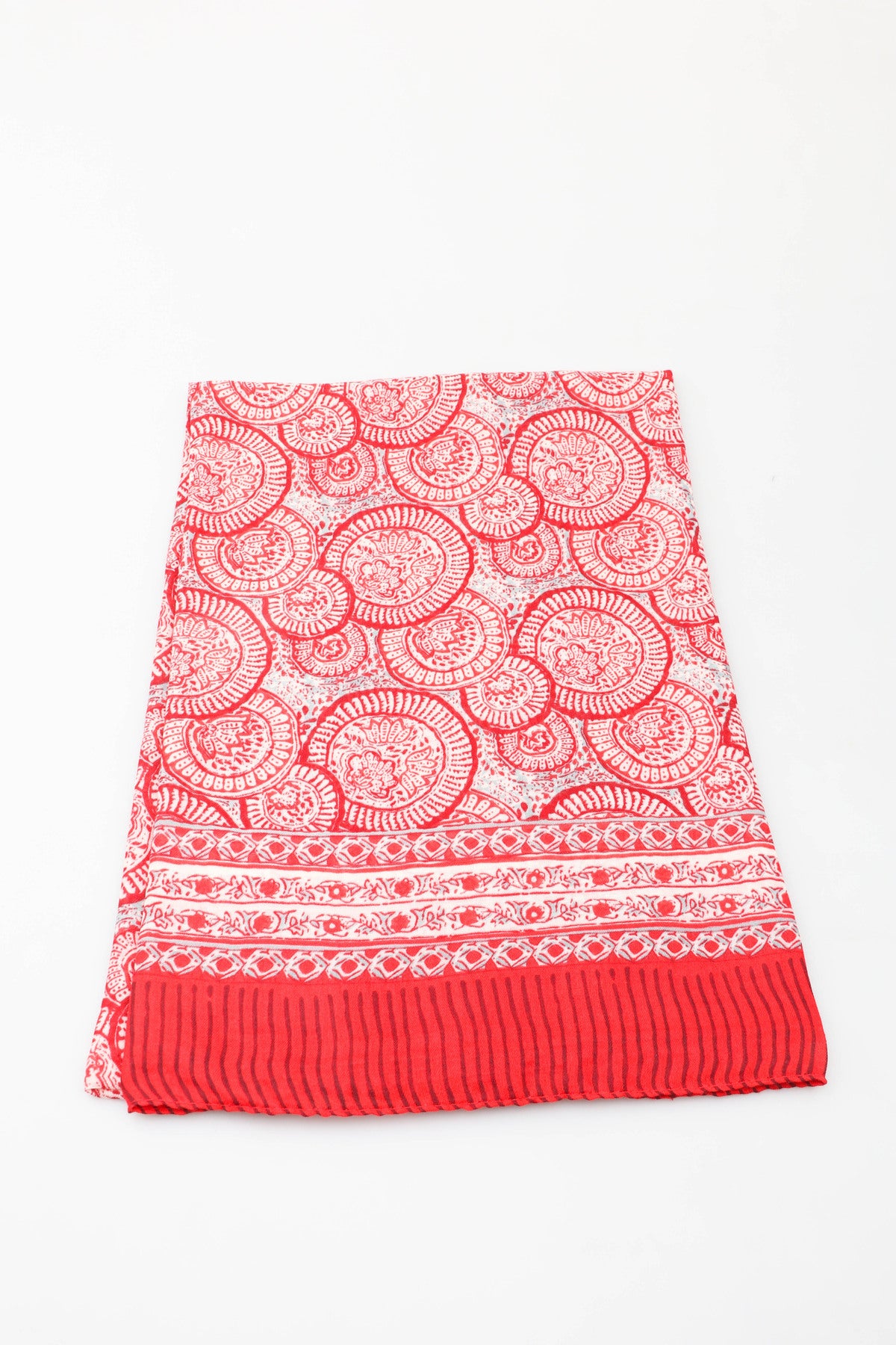 Red patterned skirt on a white background