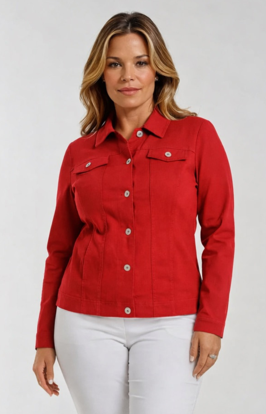 Woman wearing a red denim jacket on a white background