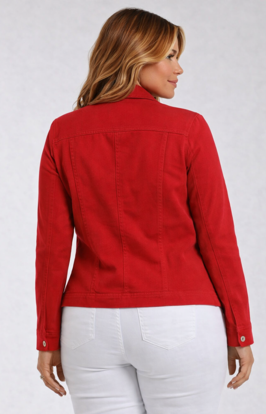 Woman wearing a red jacket on a white background