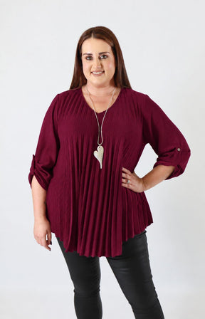 Bonnie Pleated Blouse in Wine. This image was created using AI.