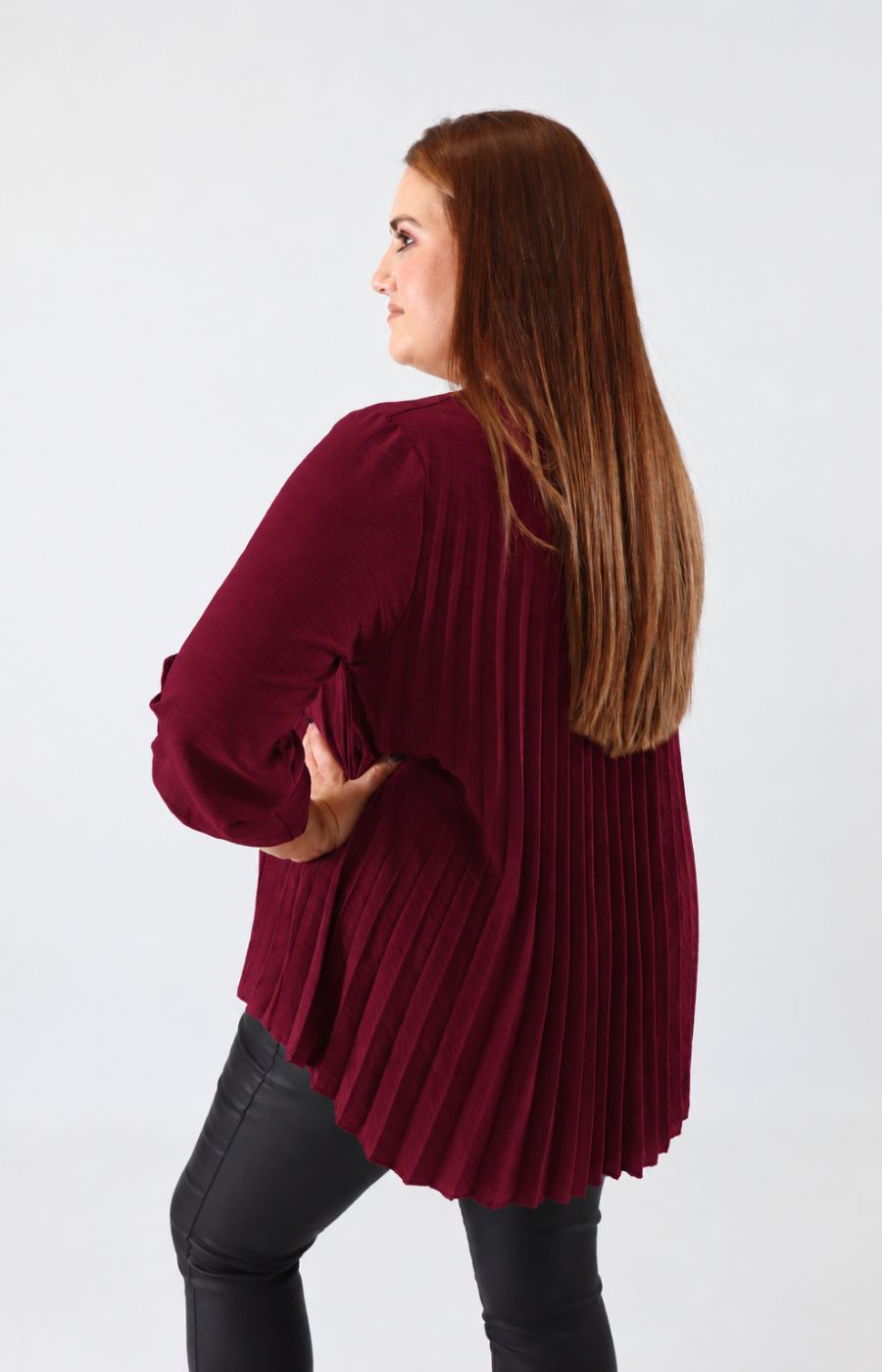 Bonnie Pleated Blouse in Wine. This image was created using AI.