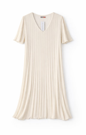 A cream pleated dress on a white background