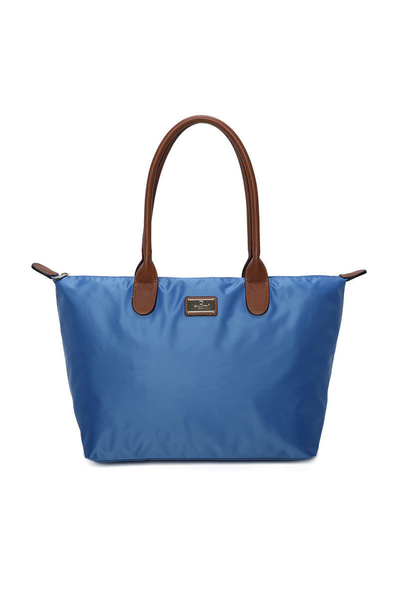 Blue tote bag with brown handles on a white background