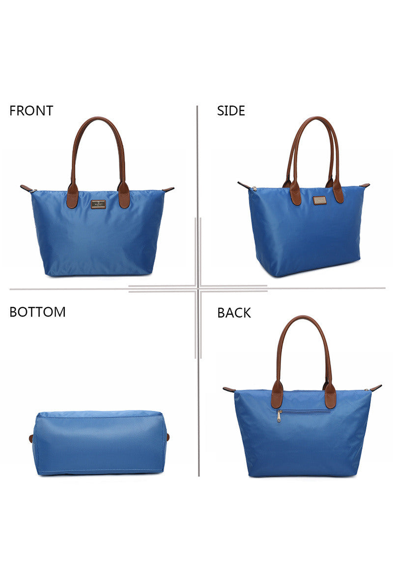 Blue handbag with brown handles shown from front, side, bottom, and back perspectives on a white background.