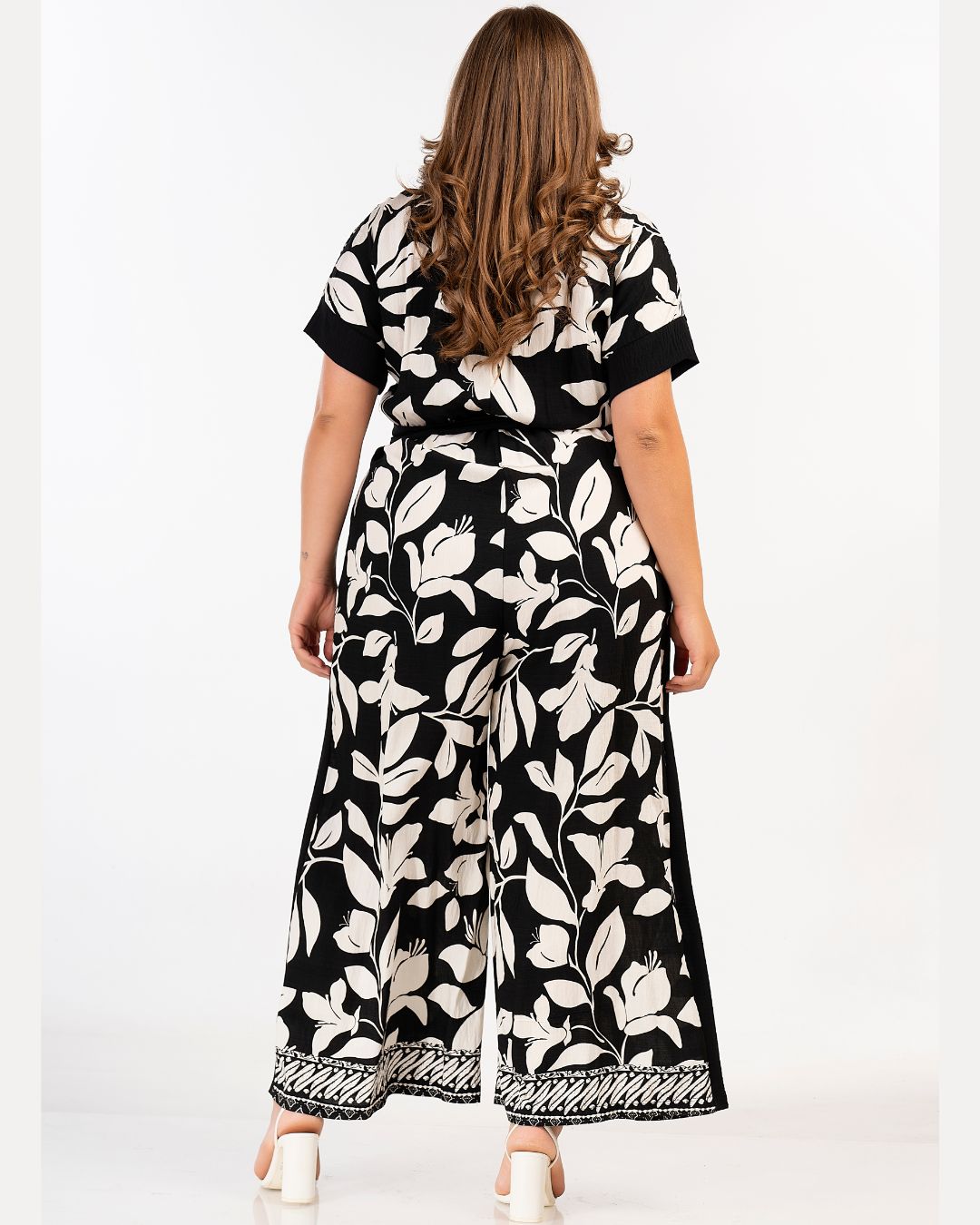 Curviss Floral Jumpsuit in Black