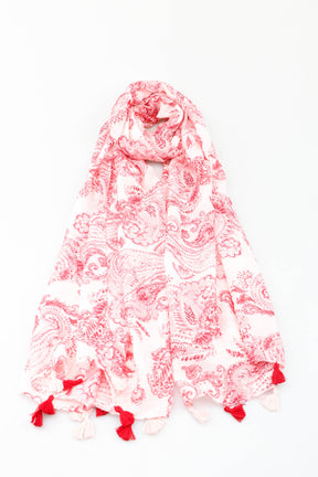 Red and white paisley print scarf on a white background