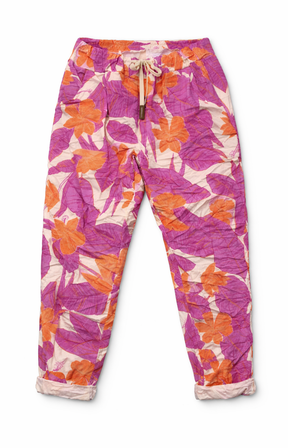 Colorful floral-patterned pants on a white background