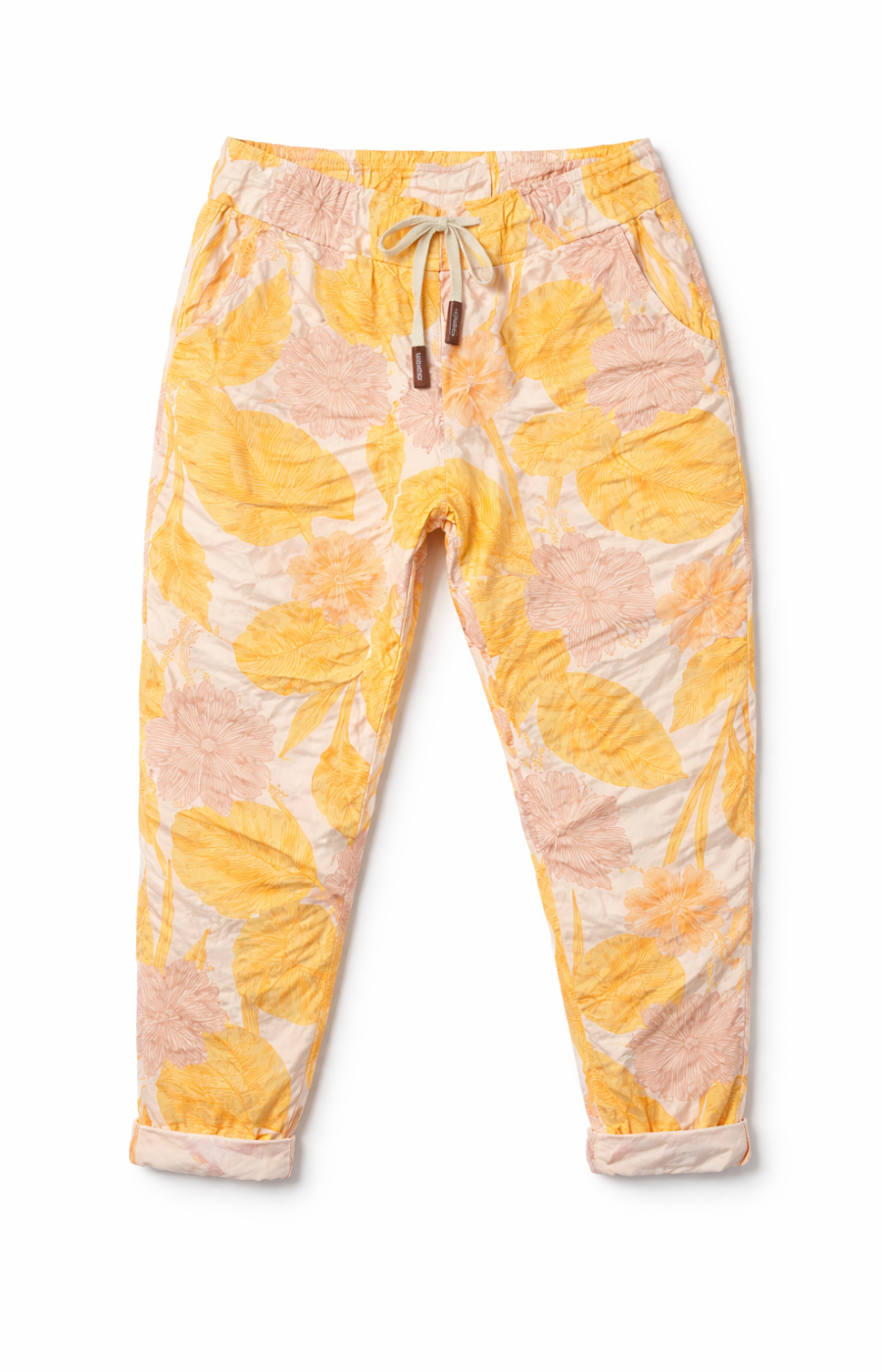Yellow and pink floral patterned pants on a white background