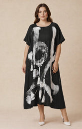 Giselle Dress in Black, A loose fit dress with an A-line shape, Round neckline, short sleeves, side pockets and a funky white brush mark design on the front