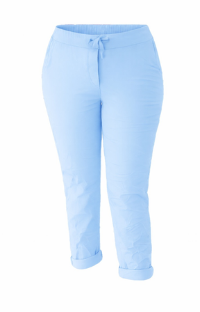 Light blue pants against a white background
