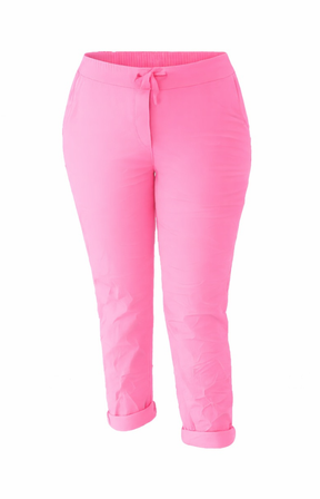 Pink pants against a white background