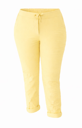 Yellow joggers on a white background
