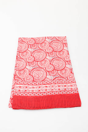 Red patterned skirt on a white background