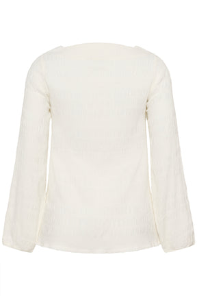 Kaffe Curve Jourtney Blouse in White, back view, a textured, long sleeve blouse with a boat neckline 