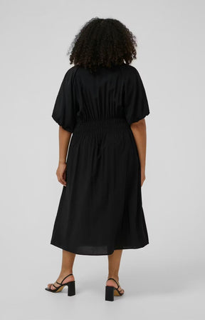 Kaffe Curve Neela Dress in Black, a midi length dress with waist elastication, 1/2 length sleeves