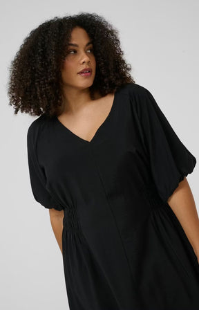 Kaffe Curve Neela Dress in Black with a V neckline, 1/2 length puff sleeves and an elasticated waist