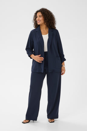 Kaffe Curve Pheolo Blazer in Navy, 3/4 length ruched sleeves, open front with collar and lapels, front pockets, styled with the matching trousers 