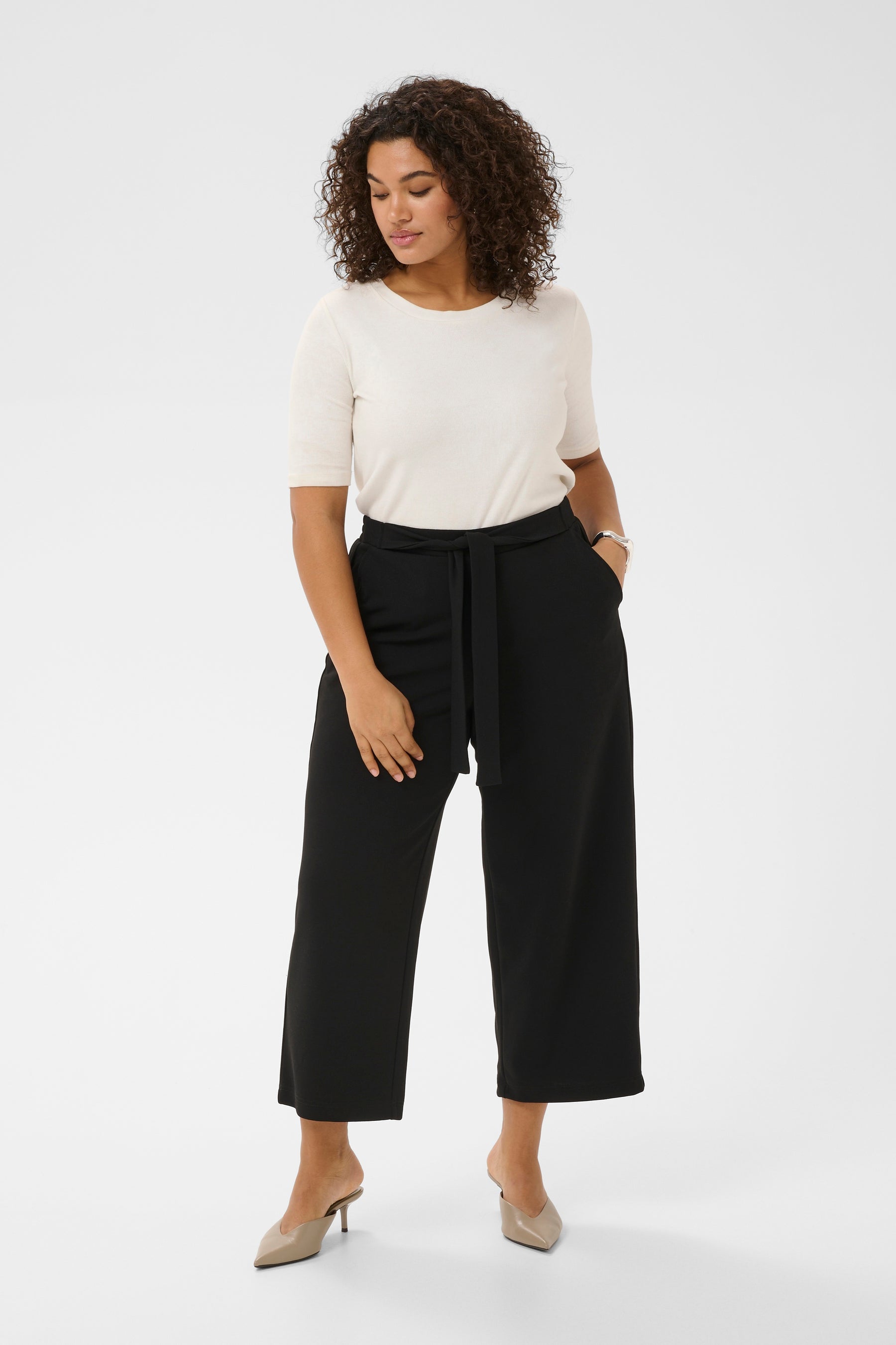 Kaffe Curve Pheolo Trousers in Black, Ankle grazing, wide leg trousers, built in tie belt styled with a white T-shirt