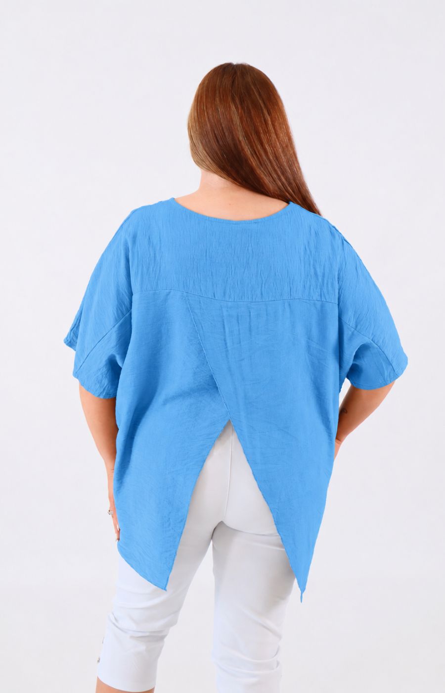 Linda Open Back Blouse in Blue. 