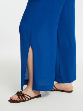 Close up of side slit on Mat Slit Trouser in Blue