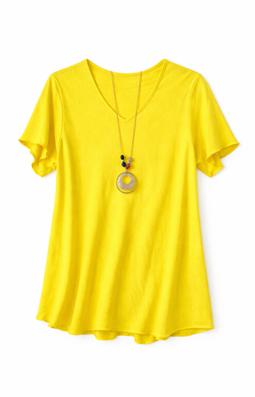 Yellow blouse with a necklace on a white background