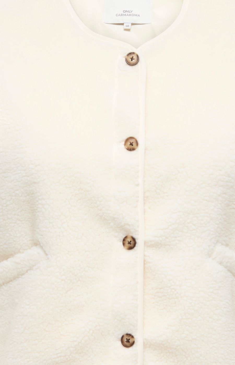 Close-up of the Only Carmakoma Baby Gilet in Cream, a cream-colored textured cardigan featuring a vertical row of tortoise shell buttons down the front.