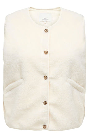 The Only Carmakoma Baby Gilet in Cream, a cream fleece sleeveless vest with brown buttons and front pockets, displayed flat against a white background.