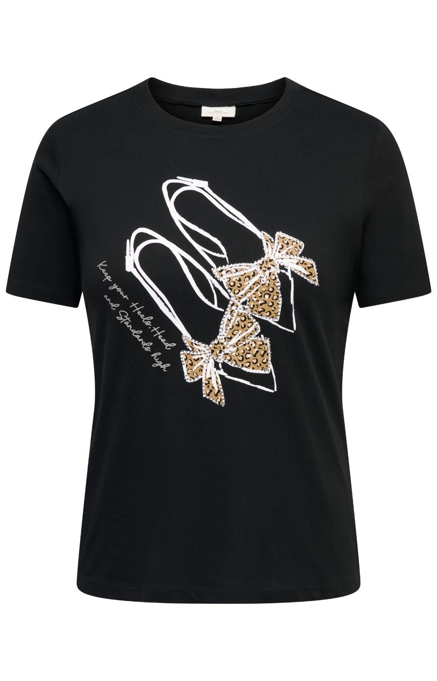 The Only Carmakoma Beau T-Shirt in Black, a black short-sleeve crewneck t-shirt featuring a graphic of two high-heeled shoes embellished with white rhinestones and leopard-print bows, with white script text on the front.