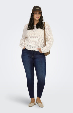 Only Carmakoma Elke Top in Cream, a knitted jumper styled with blue jeans 