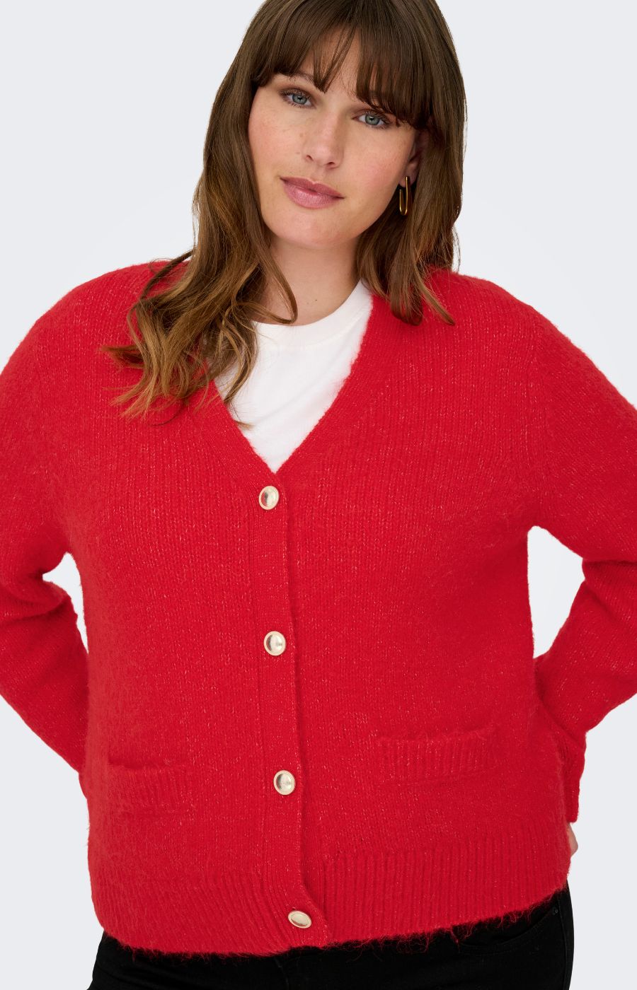 Woman wearing Only Carmakoma Maggie Cardigan in Red on a white background