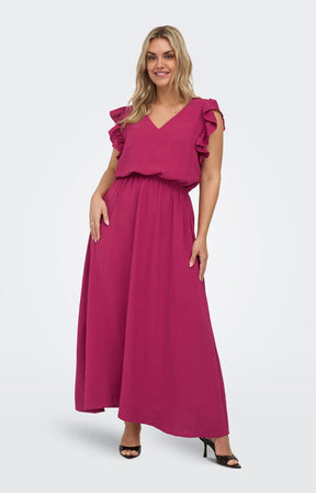 Woman wearing the Only Carmakoma Metta Dress in Wine, a V neck dress with short, frill sleeves, an elasticated waistband and an A-line maxi dress on a white background 
