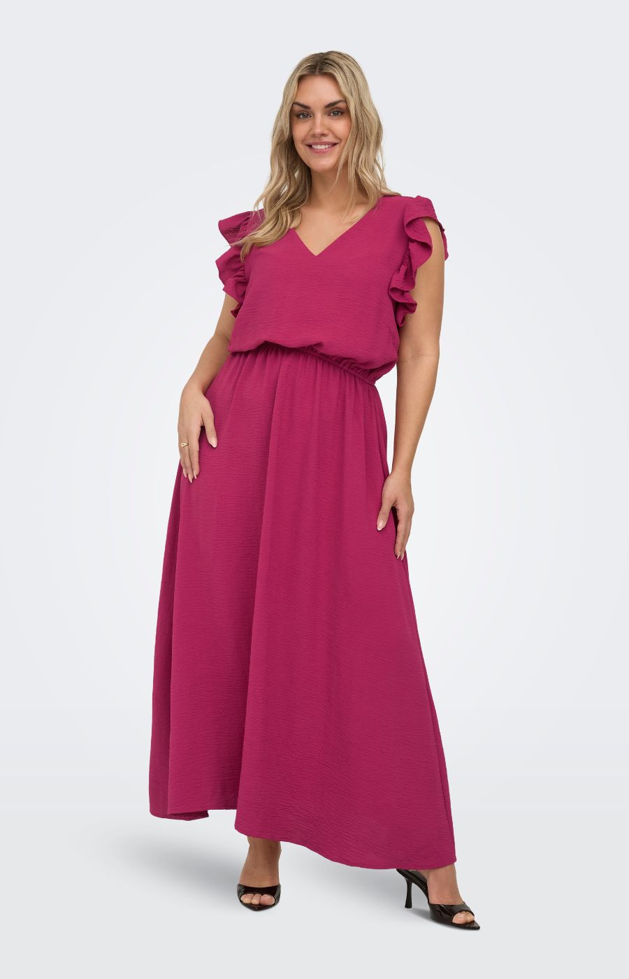 Woman wearing the Only Carmakoma Metta Dress in Wine, a V neck dress with short, frill sleeves, an elasticated waistband and an A-line maxi dress on a white background 