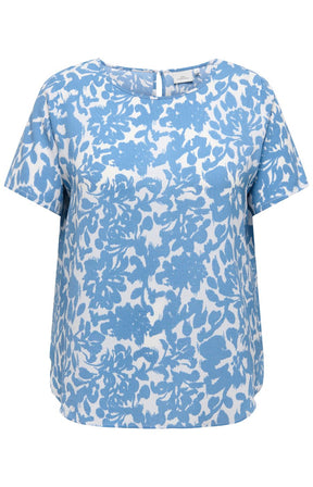 Blue and white floral patterned Vica blouse on a white background