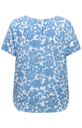 Blue and white floral patterned vica blouse on a white background