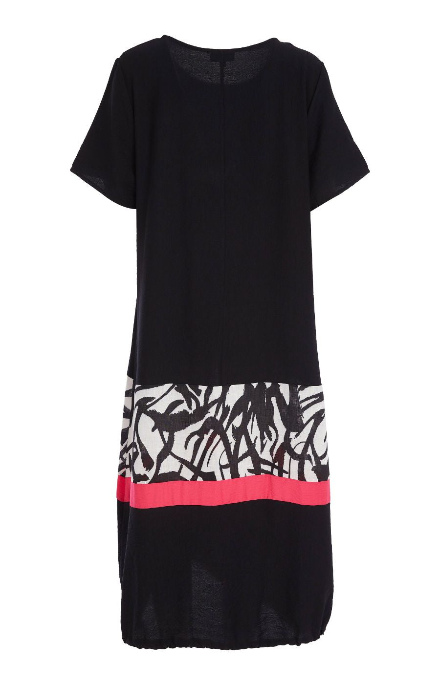 Woman wearing the Ora Dress in Black with Necklace, a black dress with a white, black and pink  design on the fron, front pocket, short sleeves and a round neckline against a white background 
