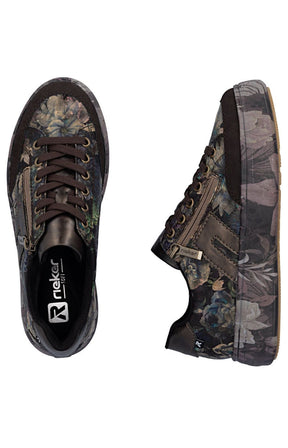 A pair of Reker brand low-top sneakers shown from two angles: a top-down view on the left and a side profile view on the right. The shoes feature a dark brown base with a muted floral pattern in blue, green, and gray tones, dark brown laces, and a black interior sole with the Reker logo.