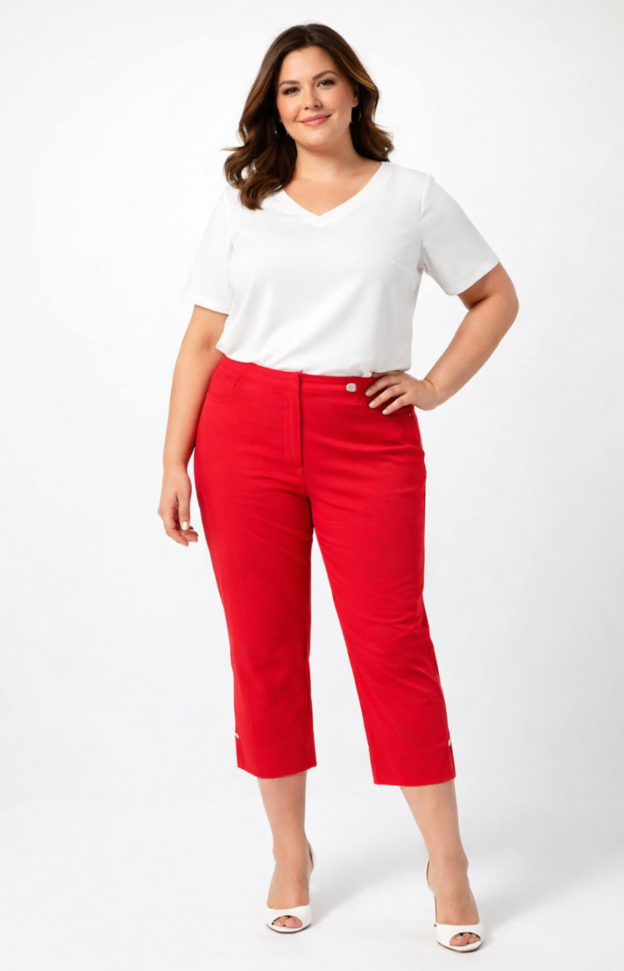 Person wearing a white top and red cropped trousers on a white background