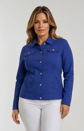 Woman wearing a blue jacket with white pants on a plain background