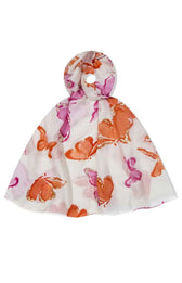 Siri Scarf in Orange, a white scarf with chic butterfly like design in orange and pink shades