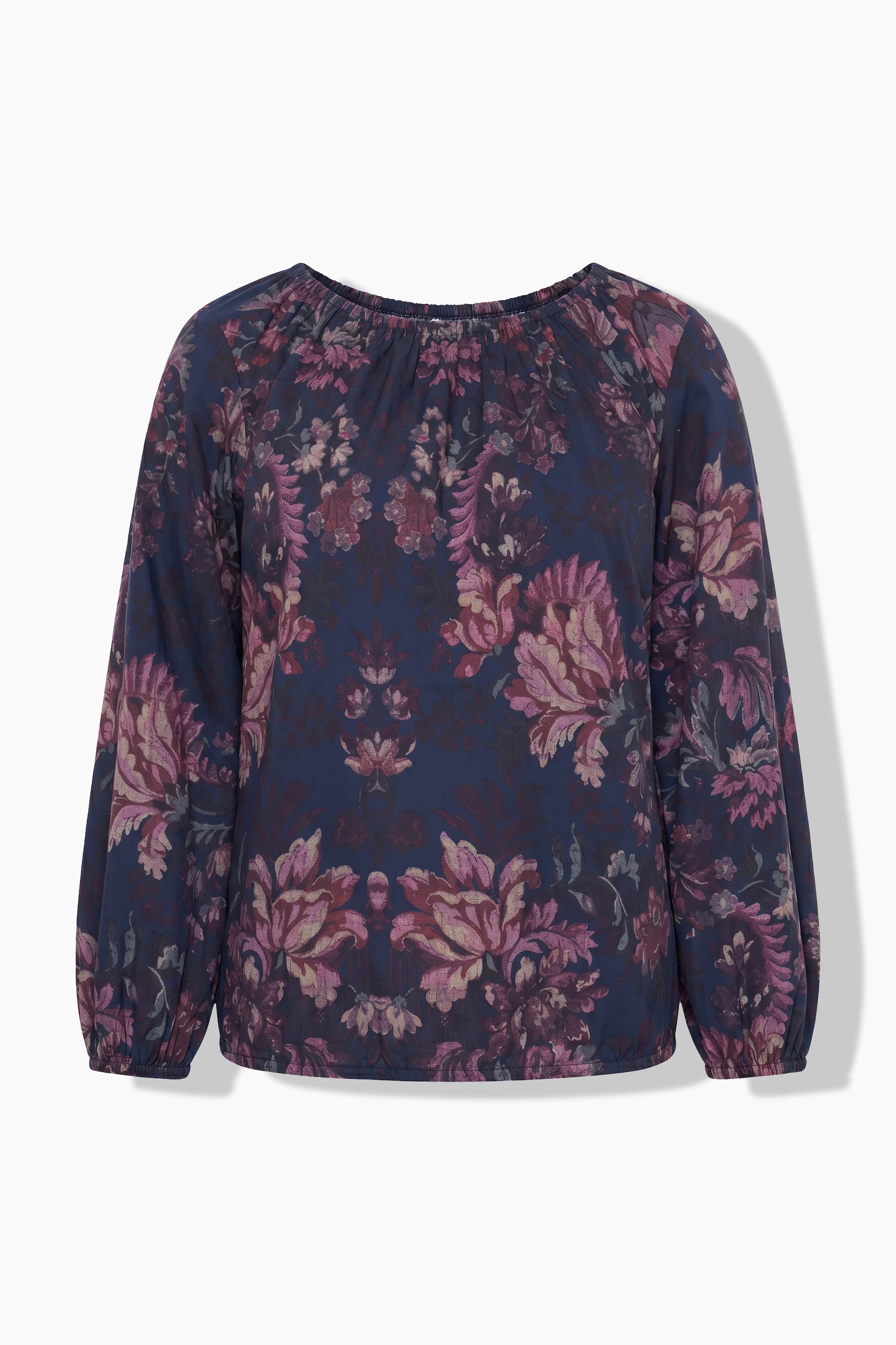 A ghost image of the Ulla Popken Floral Damask Blouse in Navy, a long-sleeve blouse with a dark navy blue base and a prominent pink and purple floral pattern, displayed against a clean white background.
