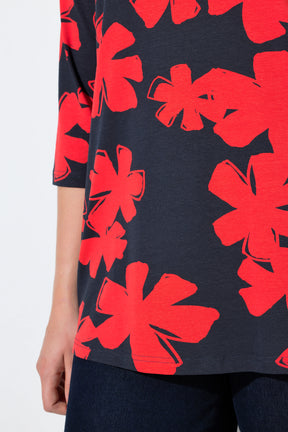 Ulla Popken Floral Keyhole Top in Red, a close up of the Navy blue top with red floral patterns on a white background