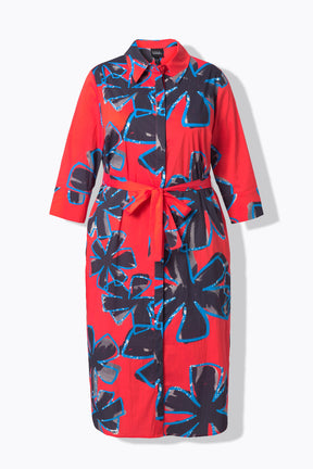 Product image of the Ulla Popken Floral Shirt Dress in Red, a red dress with blue floral pattern. This dress has a shirt collar, 3/4 length sleeves, side slits and a midi length, with a removable tie belt at the waist on a white background    