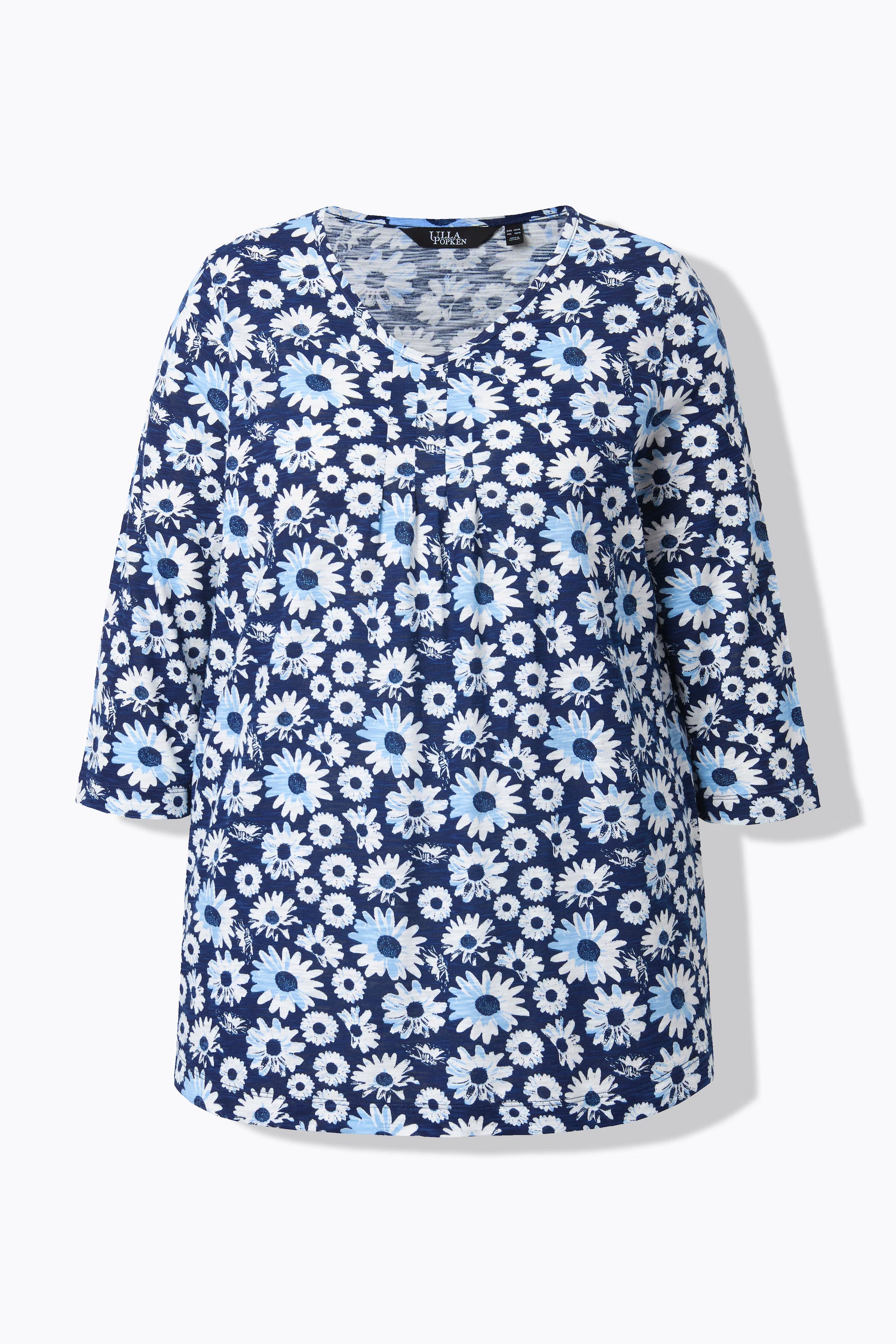 Product image of the Ulla Popken Flower Top in Blue, showing the dark blue shade with an all over white floral print, a rounded V neckline leading to decorative pleats, 3/4 length sleeves and a comfortable A-line shape 