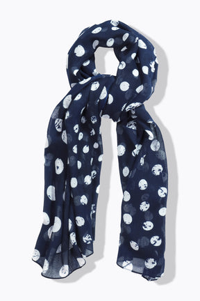 Navy blue scarf with white polka dot pattern on a white background