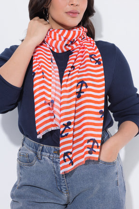 Women wearing the Ulla Popken Orange Anchor Scarf an orange and white striped scarf with anchor patterns on a plain background