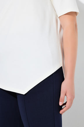 Close up of the asymmetrical hem on the Ulla Popken Pointed Hem T-Shirt in Off White