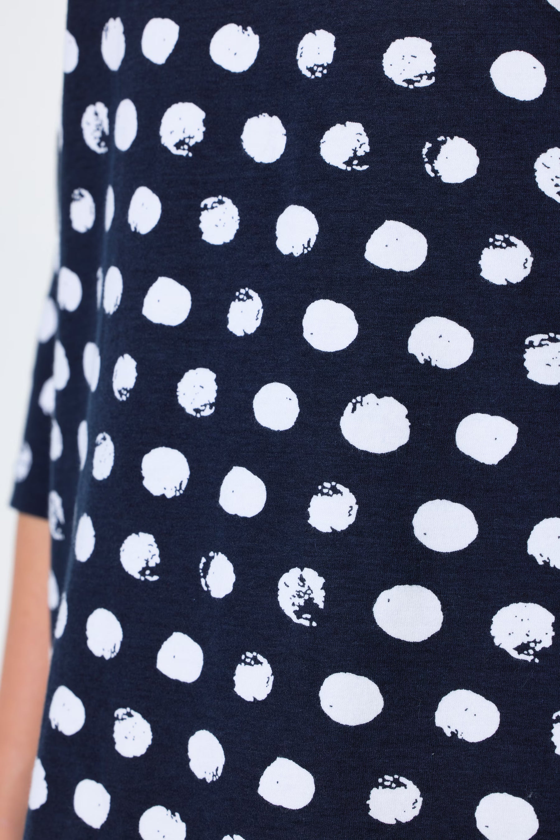 Ulla Popken Polka Dot Keyhole Top in Navy, close up of navy and white polka dot design 