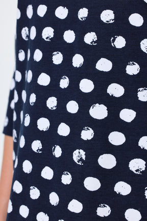 Ulla Popken Polka Dot Keyhole Top in Navy, close up of navy and white polka dot design 