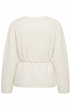 The Vero Moda Curve Cora Cardigan in Cream, A cream, long-sleeve knit cardigan with a tie waist detail, shown from the back on a plain white background. This image was created using AI.